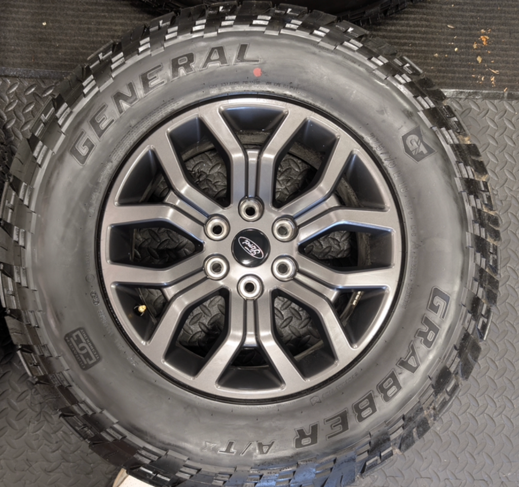 Gray Ford F-150 Tremor OEM 18” Wrapped in General Grabber A/TX 275/70R18