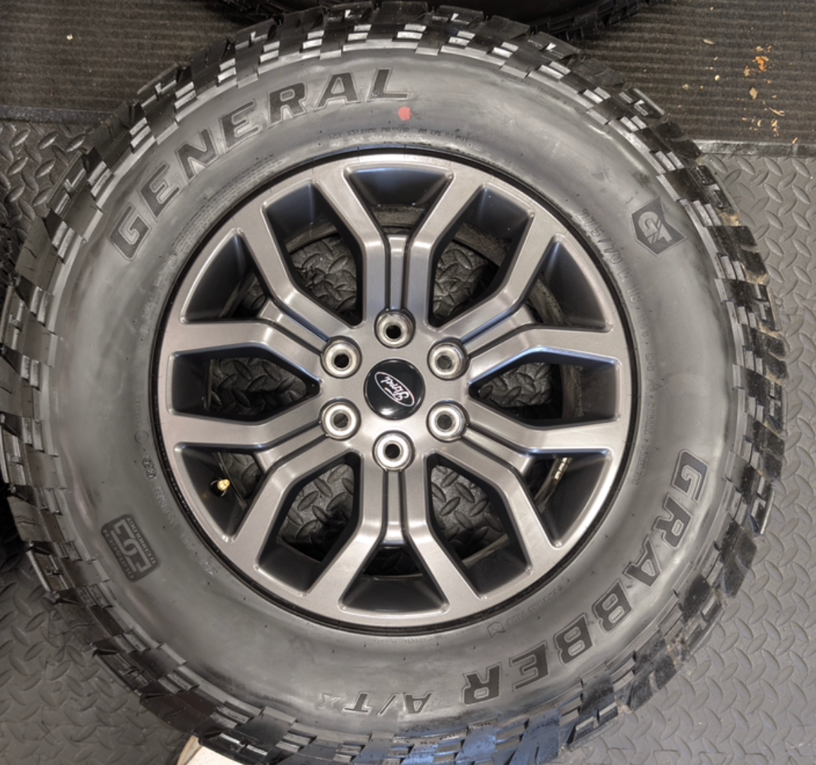 Gray Ford F-150 Tremor OEM 18” Wrapped in General Grabber A/TX 275/70R18