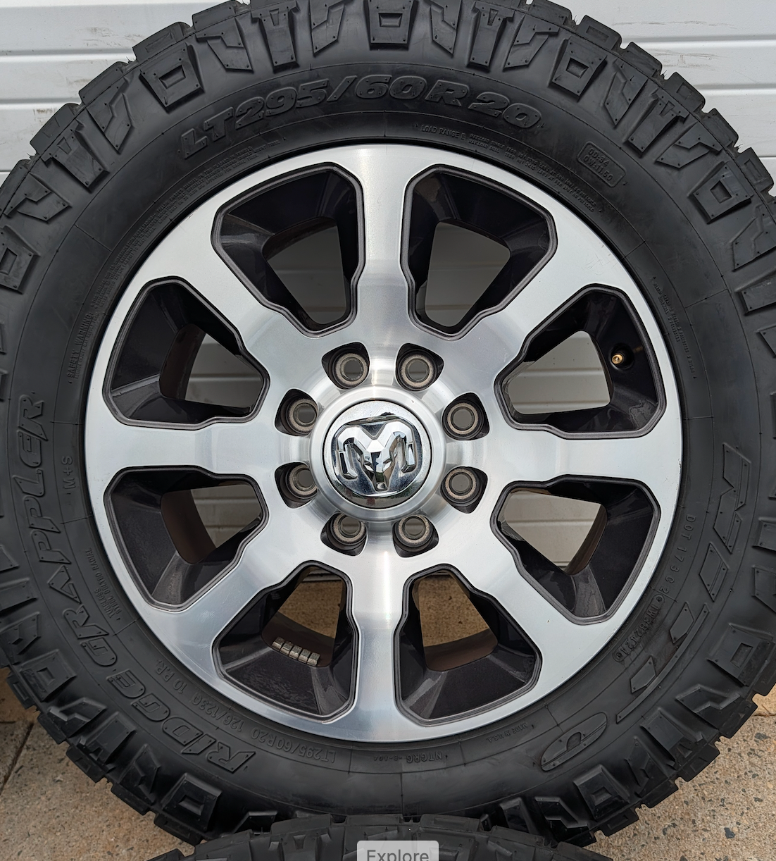Machined Ram 2500 / 3500 OEM 20” Wrapped in Nitto Ridge Grappler LT295/60R20