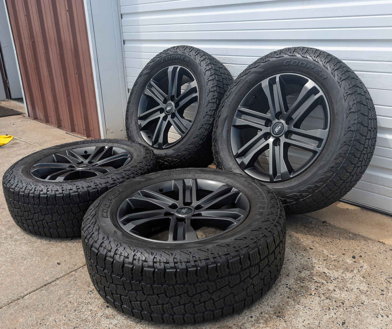 Gray Ford F-150 XLT Sport / Lariat Sport OEM 20” Wrapped in Cooper Discoverer Road+Trail A/T 275/60R20