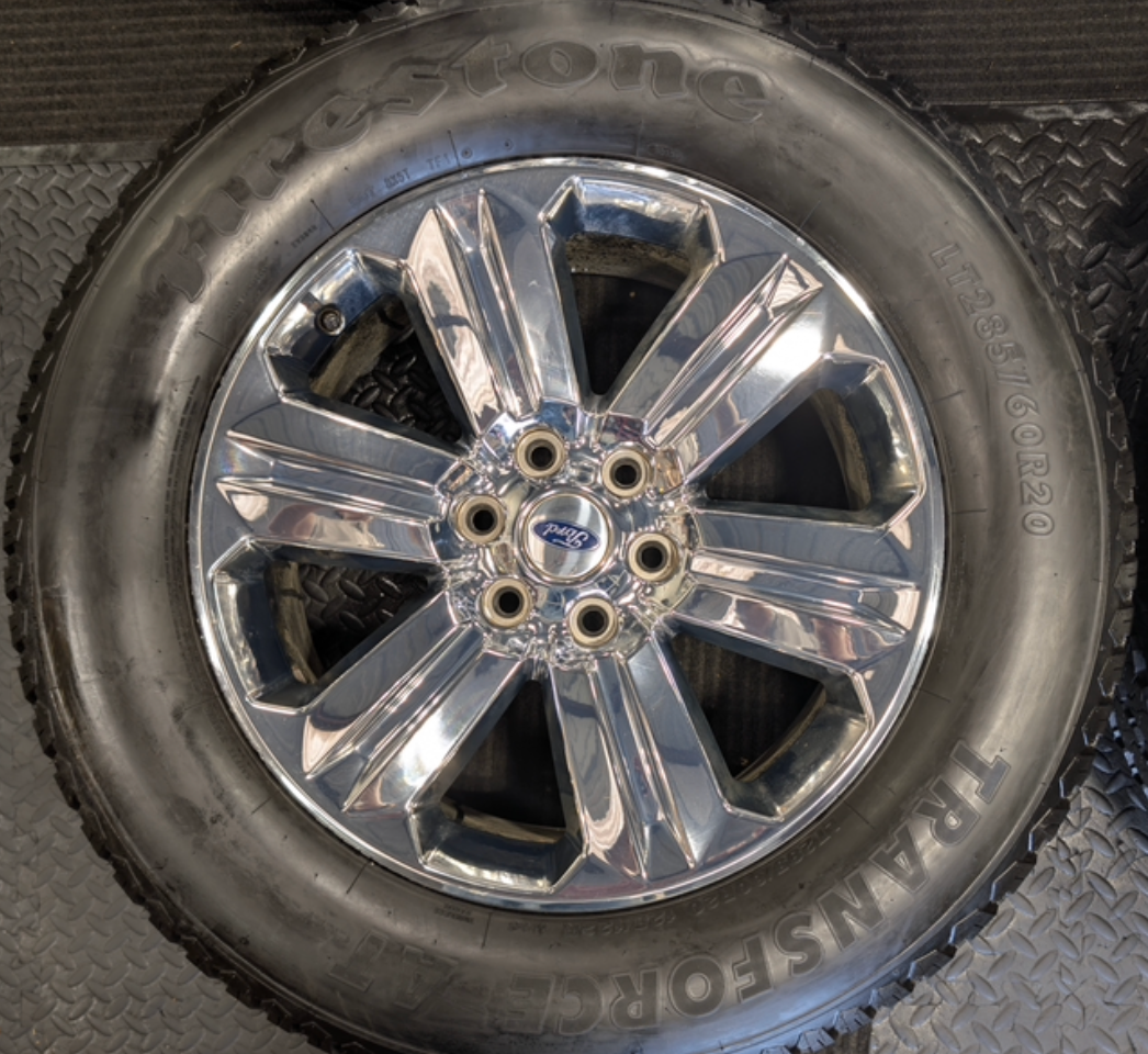 Chrome Ford F-150 OEM 20” Wrapped in Firestone Transforce A/T LT285/60R20