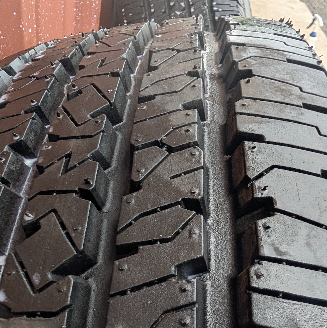 Polished Aluminum Ram 2500 / 3500 OEM 18” Wrapped in Firestone Transforce HT LT275/70R18