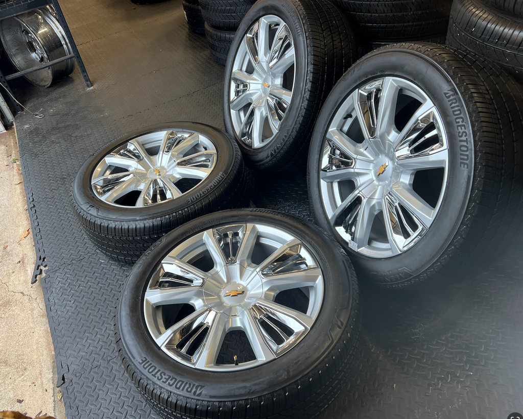 OEM 22” Chevrolet High Country Wheels wrapped in Bridgestone tires.