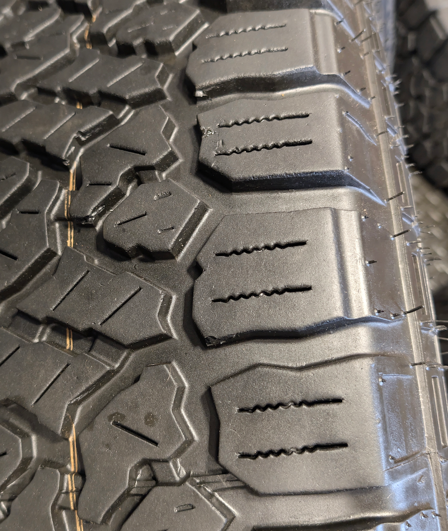 OEM 20” GMC Sierra Denali Black Wheels wrapped in Kenda Klever A/T tires.