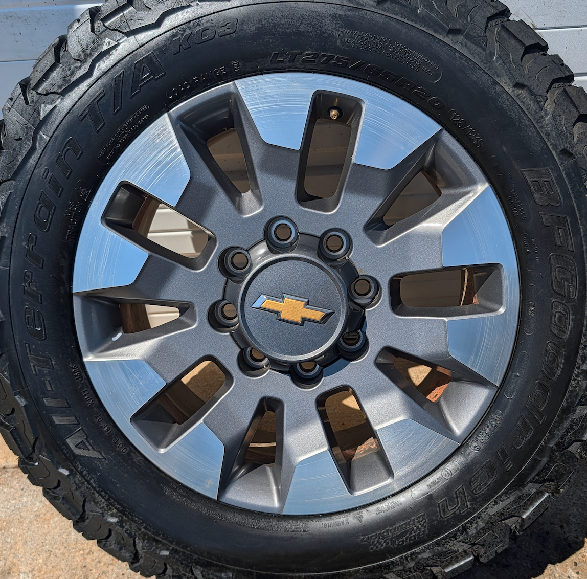 OEM 20” Chevrolet Silverado 2500HD / 3500HD Wheels with Machined Grey Finish wrapped in LT275/65R20 BFGoodrich All-Terrain T/A KO3 tires.