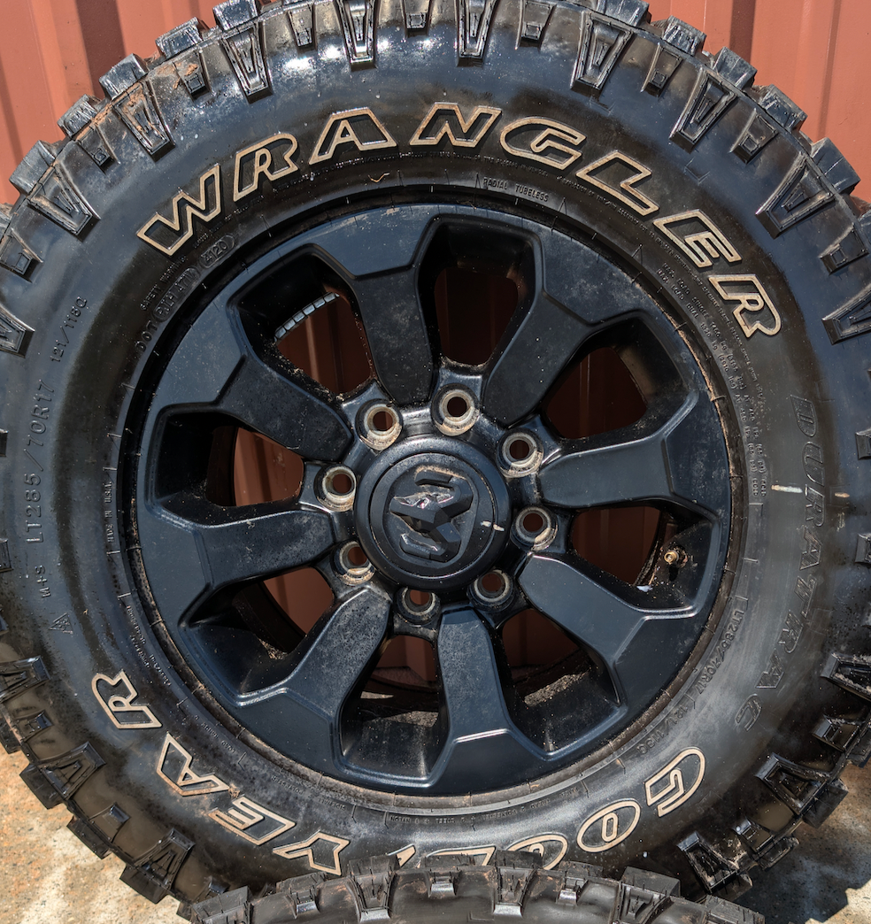 Matte Black Ram 2500 Power Wagon OEM 17” Wrapped in Goodyear Wrangler DuraTrac LT285/70R17