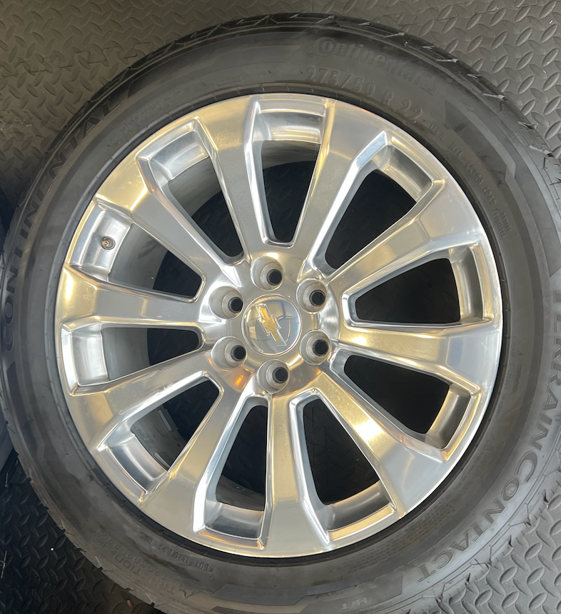 OEM 22”  High Country Polished Aluminum Wheels wrapped in Continental TerrainContact tires.