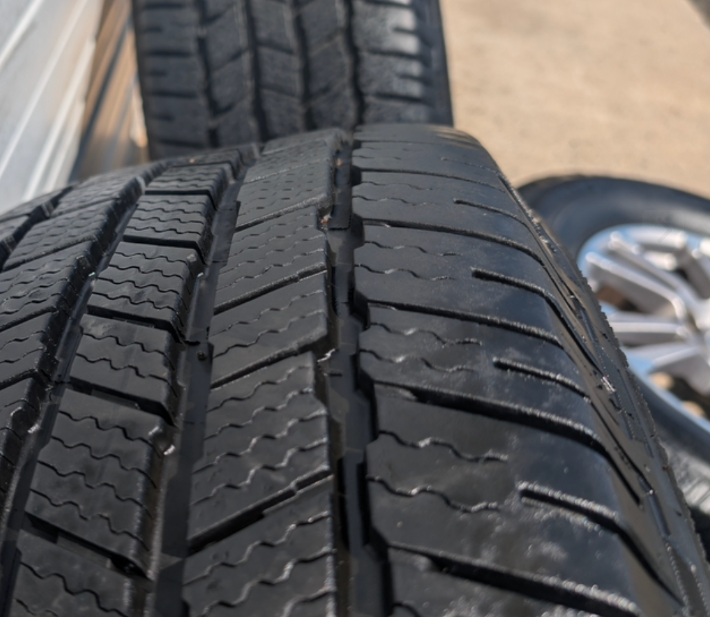 Gray Machined Ford F-150 Lariat OEM 18” Wrapped in Michelin Defender LTX 275/65R18