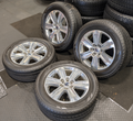 Machined Aluminum Ford F-150 OEM 20” Wrapped in Yokohama Geolandar G91F 275/55R20