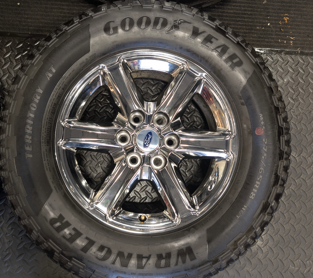 Chrome Ford F-150 OEM 18” Wrapped in Goodyear Wrangler Territory A/T 275/65R18