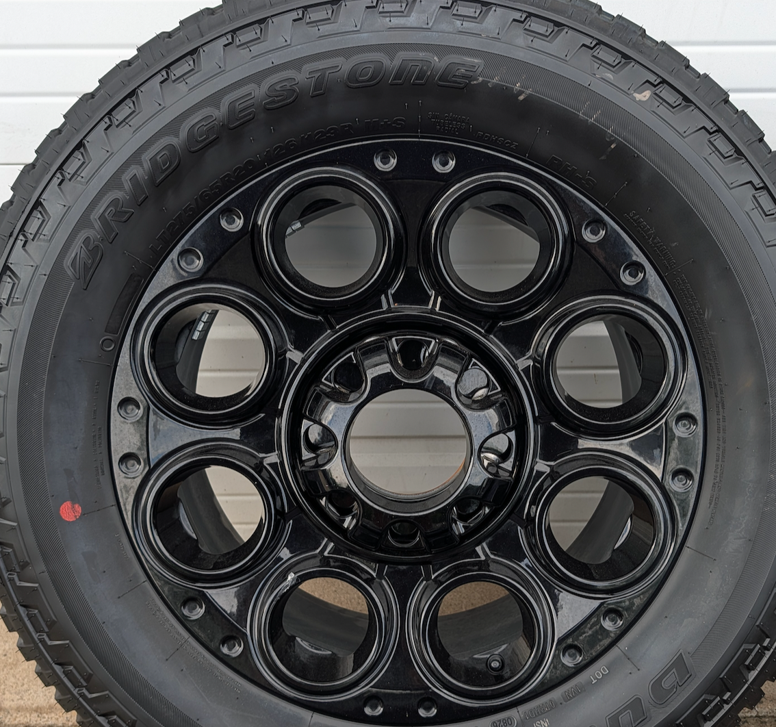 Gloss Black Ford F-250 / F-350 Super Duty Tremor OEM 20” Wrapped in Bridgestone Dueler A/T LT275/65R20