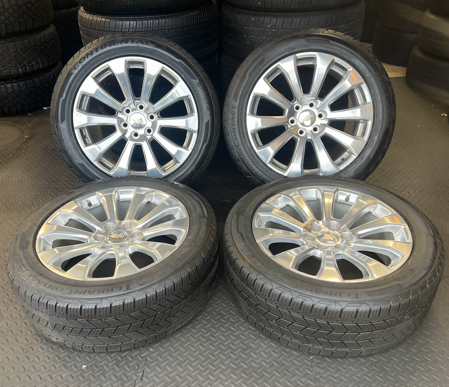 OEM 22”  High Country Polished Aluminum Wheels wrapped in Continental TerrainContact tires.