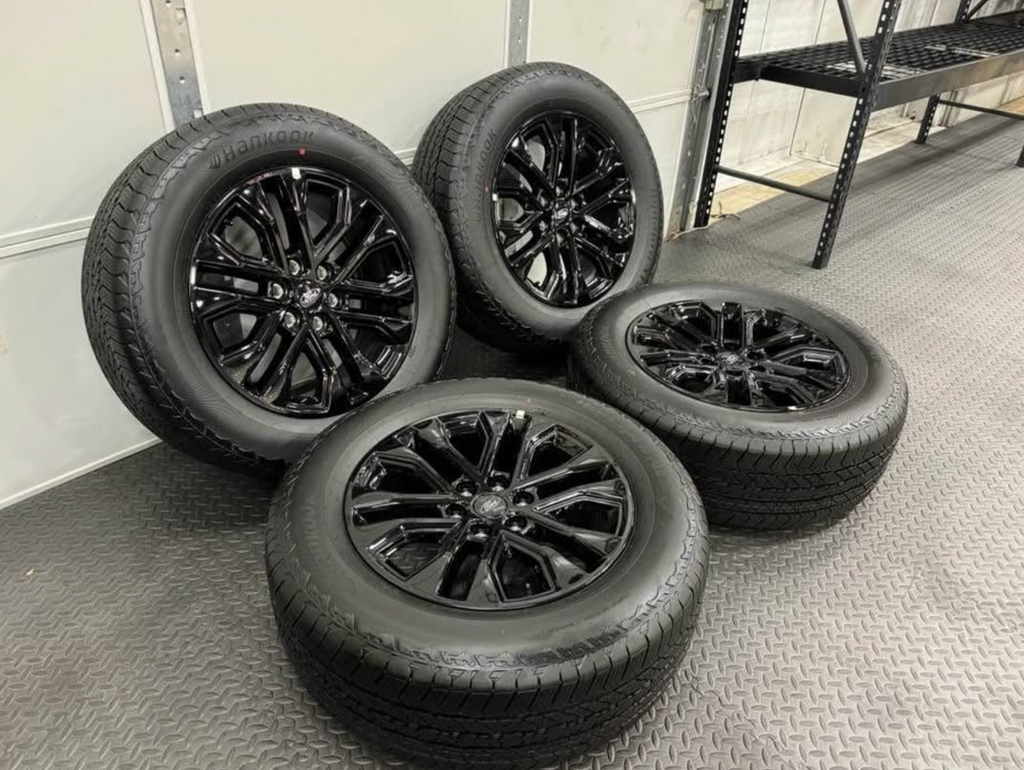 2026 F-150 Lariat black appearance OEM wheels wrapped in 275/60/20 Hankook Dynapro at2 tires