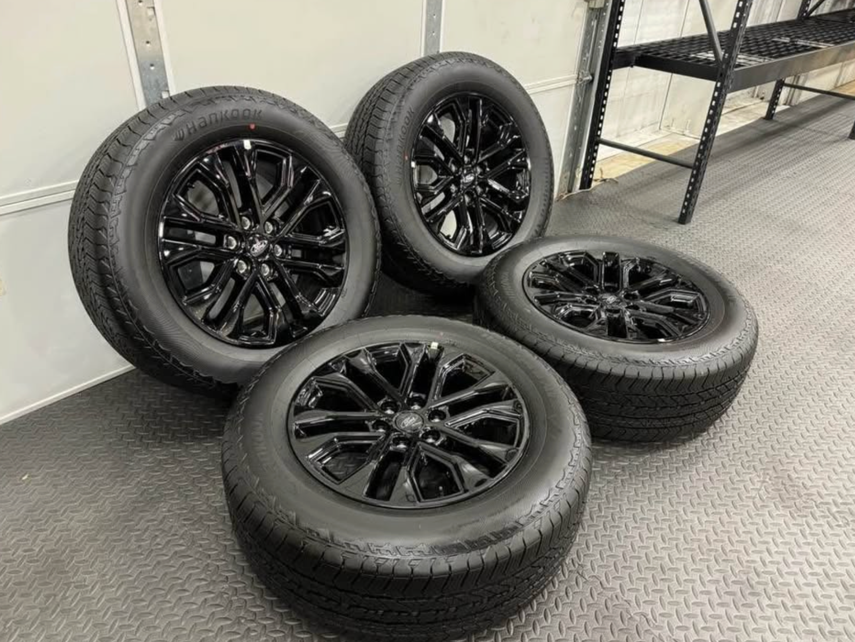 2026 F-150 Lariat black appearance OEM wheels wrapped in 275/60/20 Hankook Dynapro at2 tires