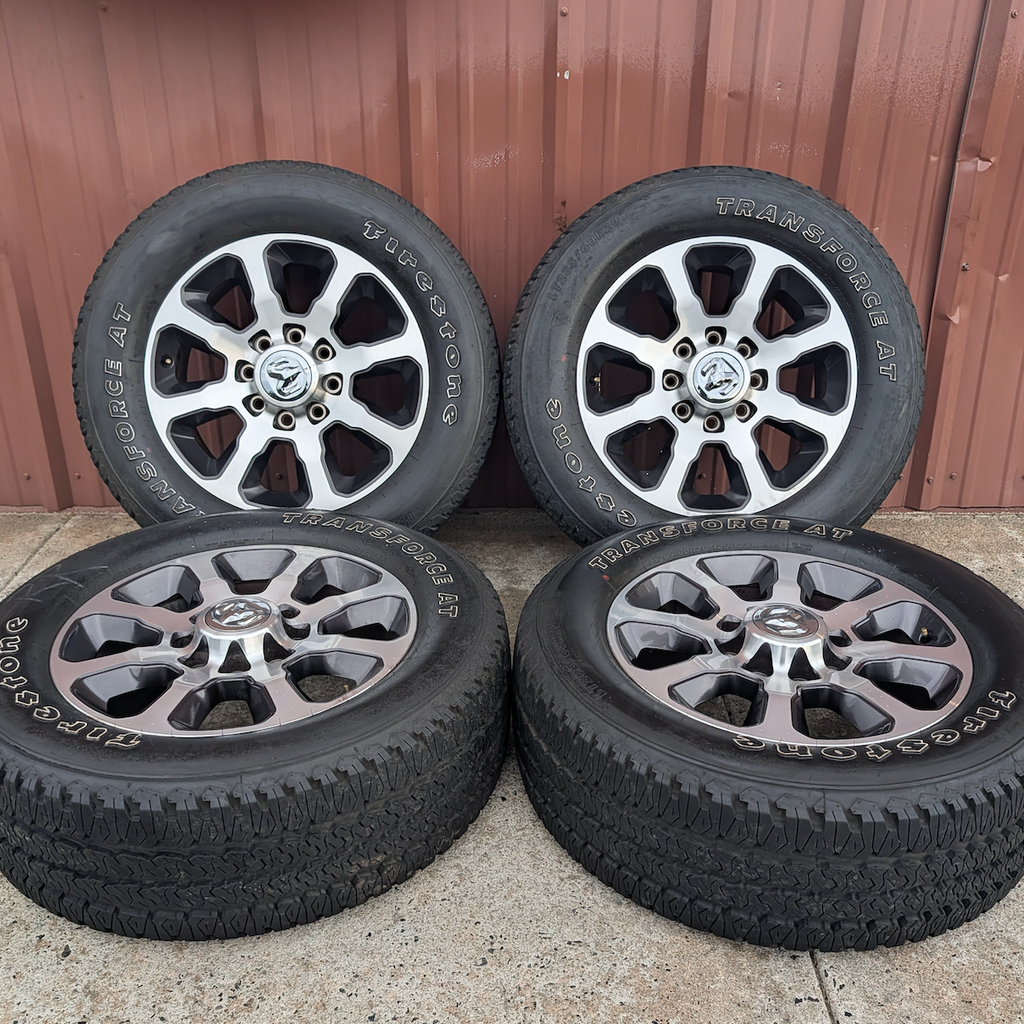 Machined 2500 / 3500 Laramie Longhorn OEM 20” Wrapped in Firestone Transforce A/T LT285/60R20