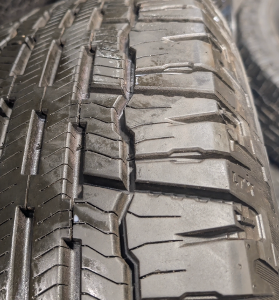 Chrome GM 2500HD / 3500HD OEM 20” Wrapped in Michelin Defender LTX