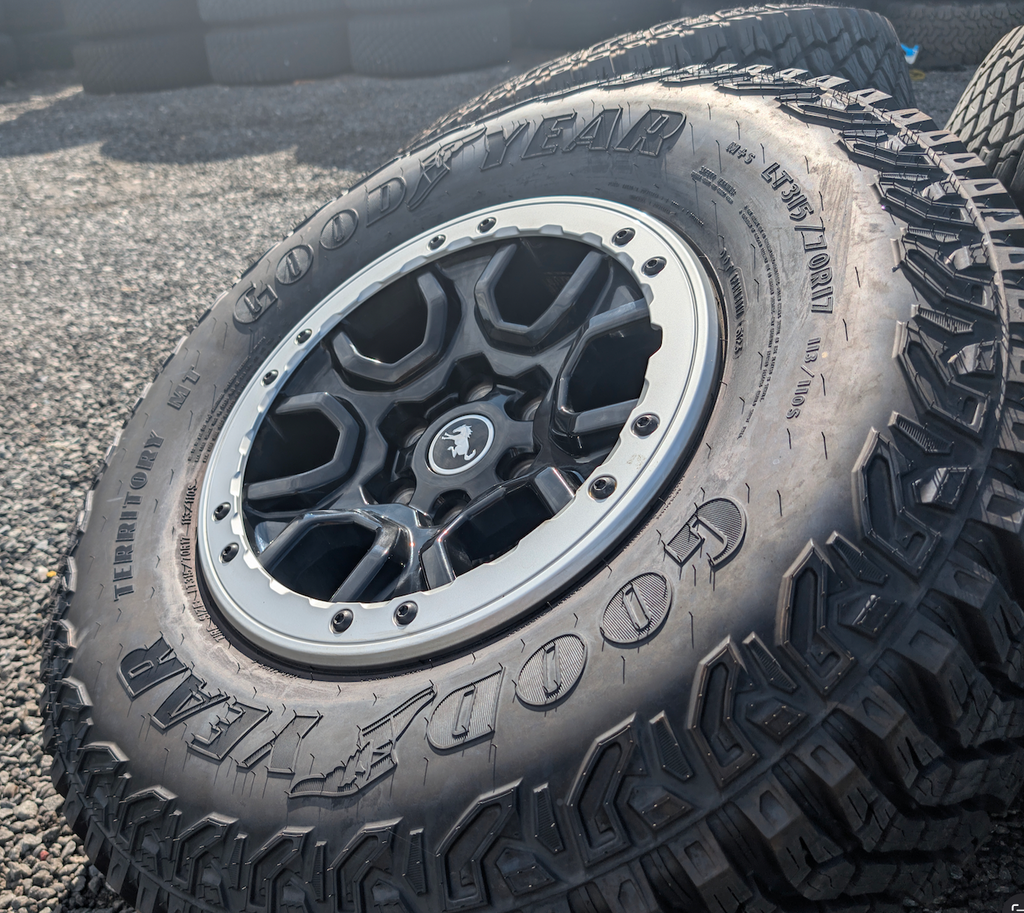 Machined Ford Bronco Sasquatch OEM 17” Wrapped in Goodyear Wrangler Territory M/T LT315/70R17