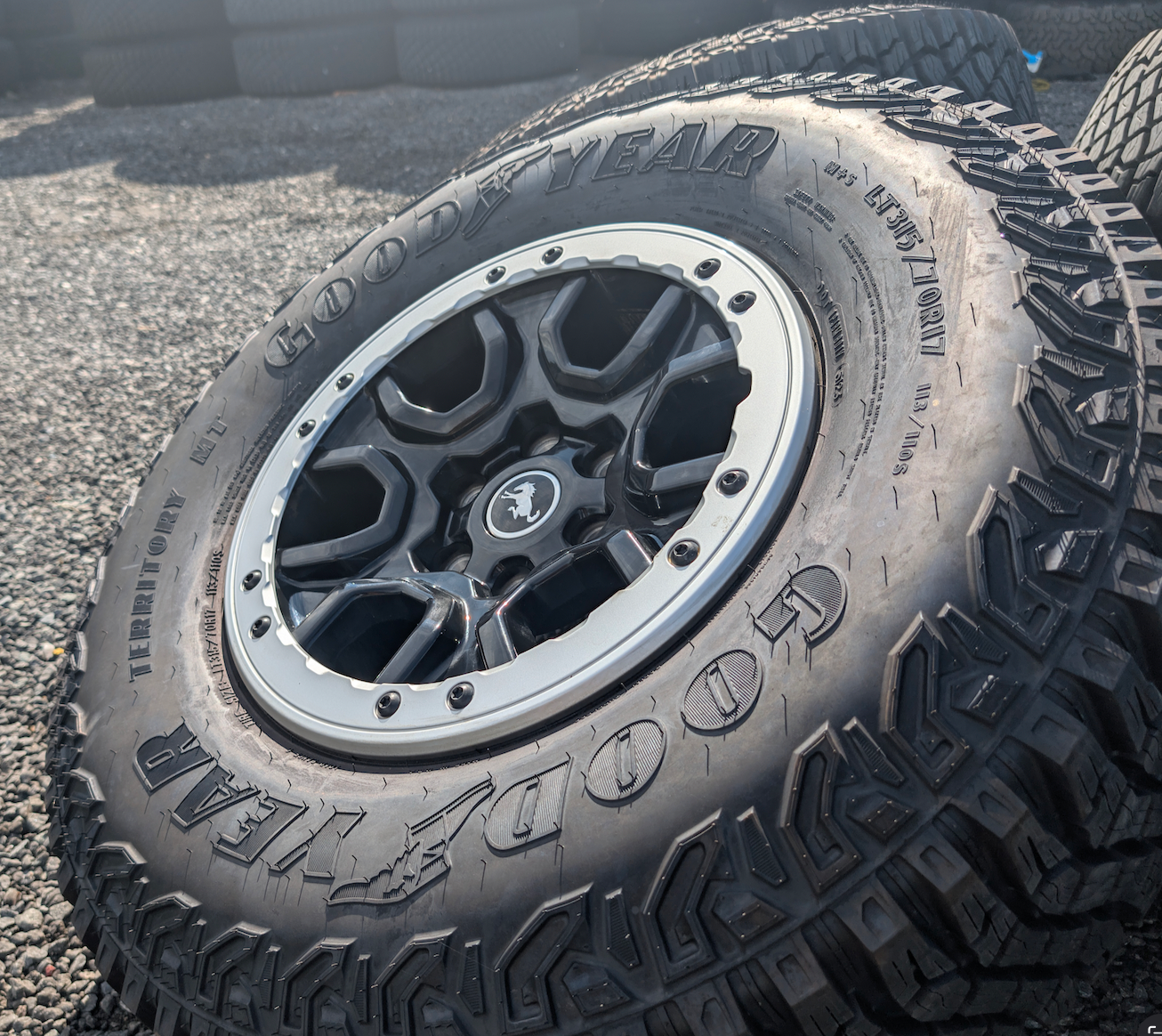 Machined Ford Bronco Sasquatch OEM 17” Wrapped in Goodyear Wrangler Territory M/T LT315/70R17
