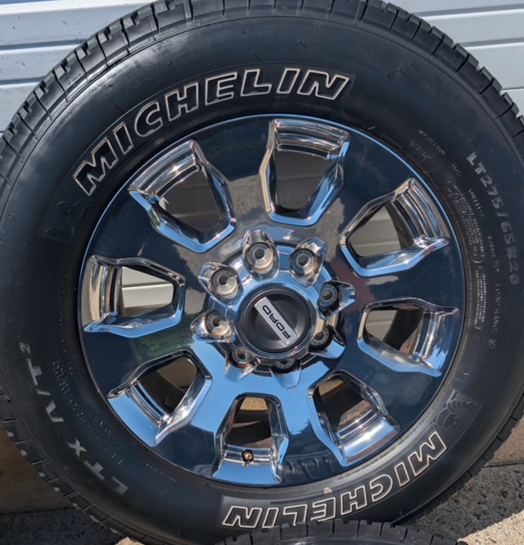 OEM 20” Chrome Ford F-250 King Ranch Wheels wrapped in Michelin LTX A/T2 tires.