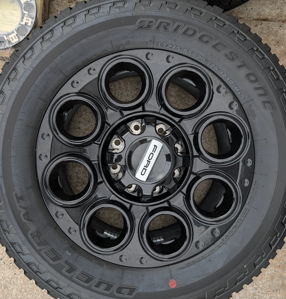 Gloss Black Ford F-250 / F-350 Super Duty Tremor OEM 20” Wrapped in Bridgestone Dueler A/T LT275/65R20