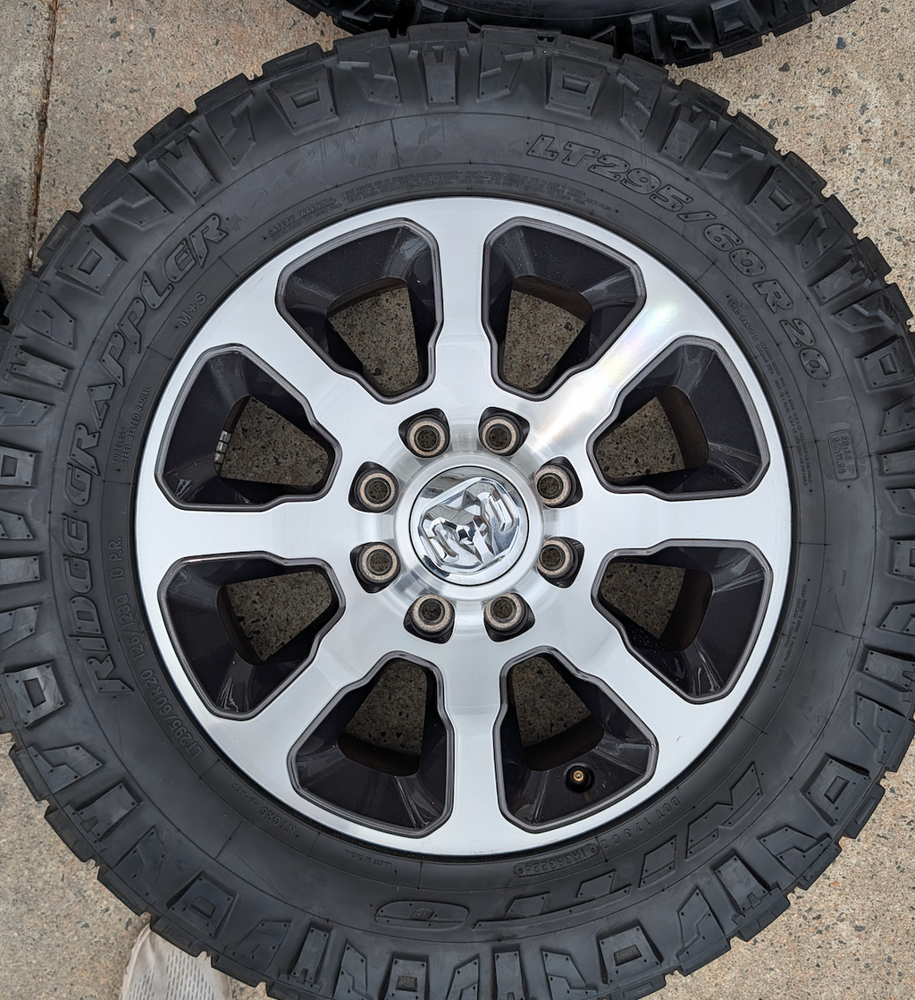 Machined Ram 2500 / 3500 OEM 20” Wrapped in Nitto Ridge Grappler LT295/60R20