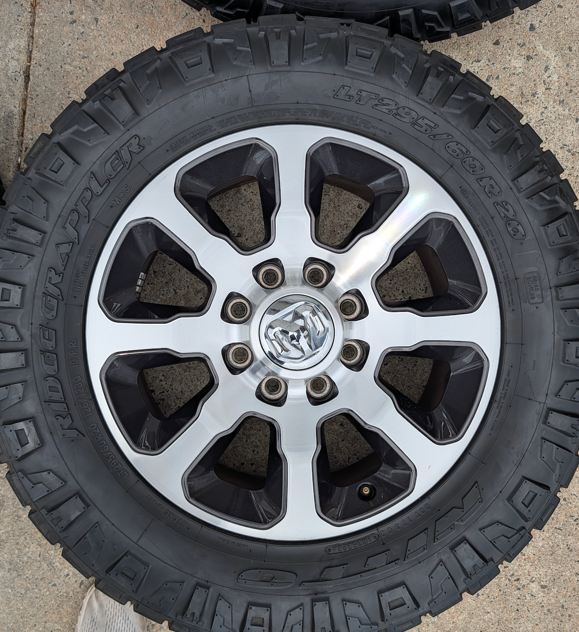 Machined Ram 2500 / 3500 OEM 20” Wrapped in Nitto Ridge Grappler LT295/60R20