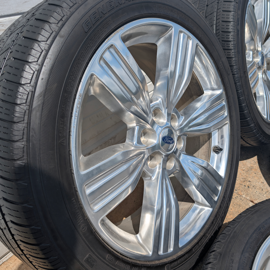 Polished Ford Expedition King Ranch / Limited OEM 22” Wrapped in General Grabber HTS60 285/45R22
