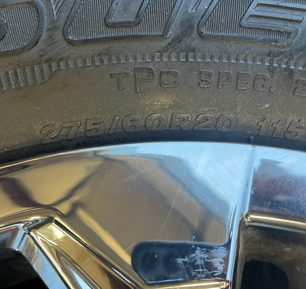 OEM 20” Chrome Wheels wrapped in Bridgestone Dueler tires.