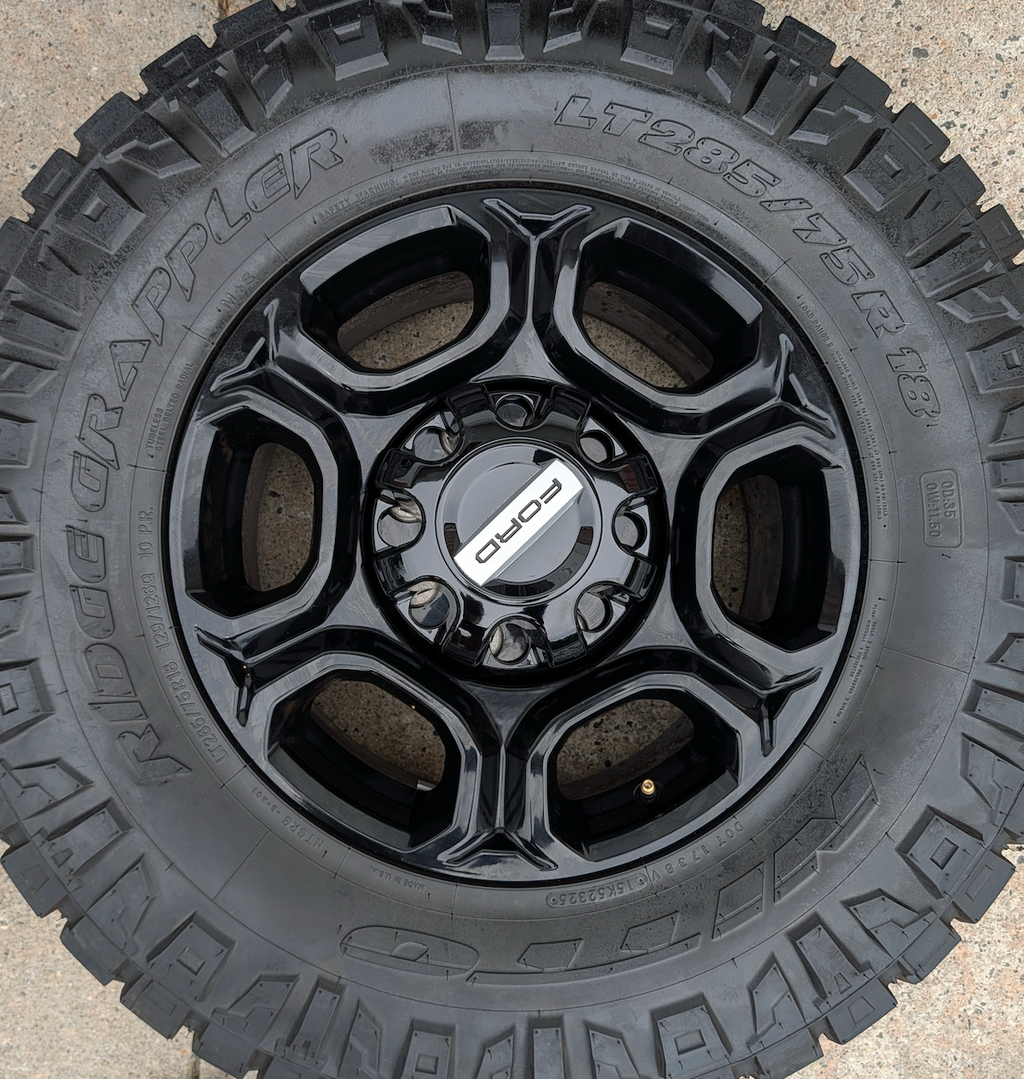 Gloss Black Ford F-250 / F-350 Super Duty OEM 18” Wrapped in Nitto Ridge Grappler LT285/75R18