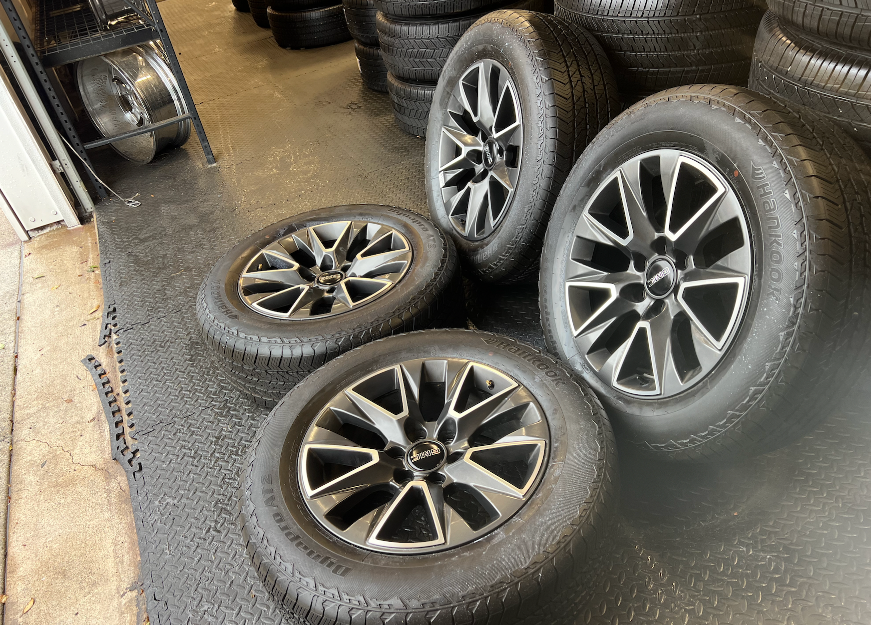 OEM 20” Wheels wrapped in Hankook Dynapro AT2 tires.