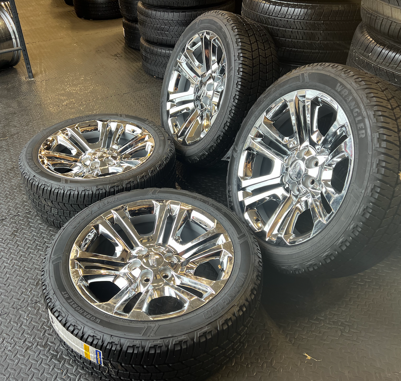 OEM 22” Split 6 Chrome  Wheels wrapped in Goodyear Wrangler Workhorse HT tires.