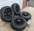 Gloss Black Ford F-250 / F-350 Super Duty Tremor OEM 20” Wrapped in Bridgestone Dueler A/T LT275/65R20