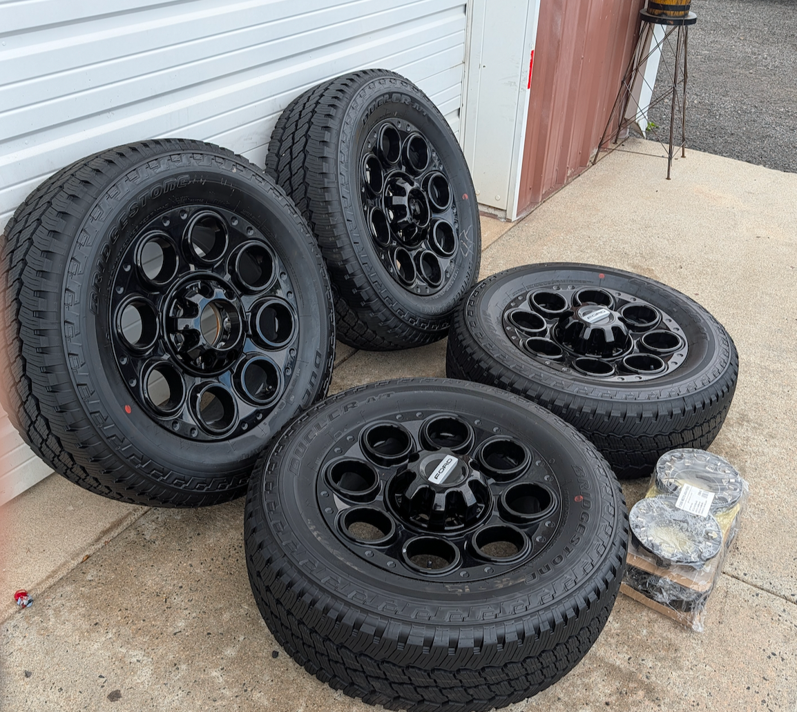 Gloss Black Ford F-250 / F-350 Super Duty Tremor OEM 20” Wrapped in Bridgestone Dueler A/T LT275/65R20