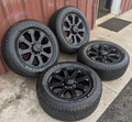 Matte Black Ram 2500 / 3500 OEM 20” Wrapped in Firestone Transforce AT2 LT285/60R20