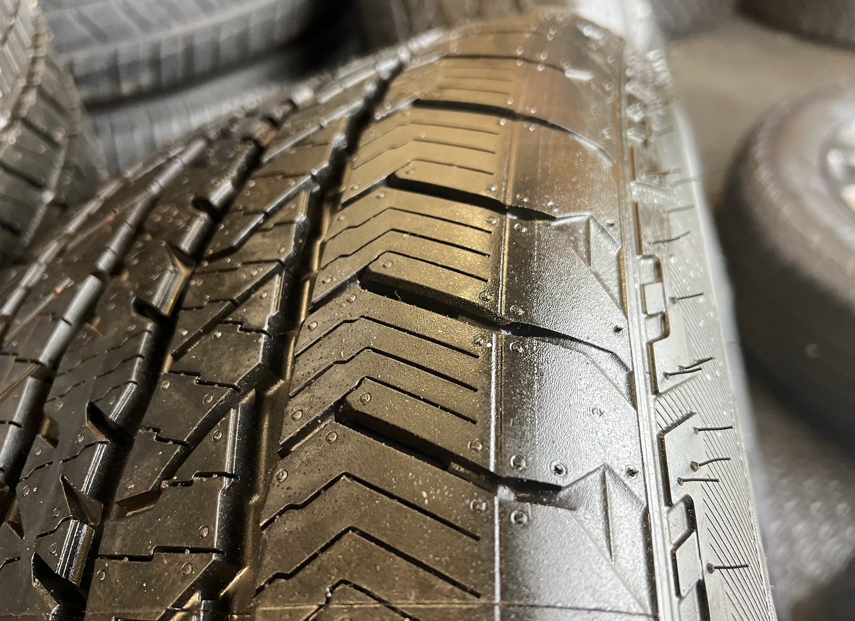 OEM 20” Wheels wrapped in Hankook Dynapro AT2 tires.