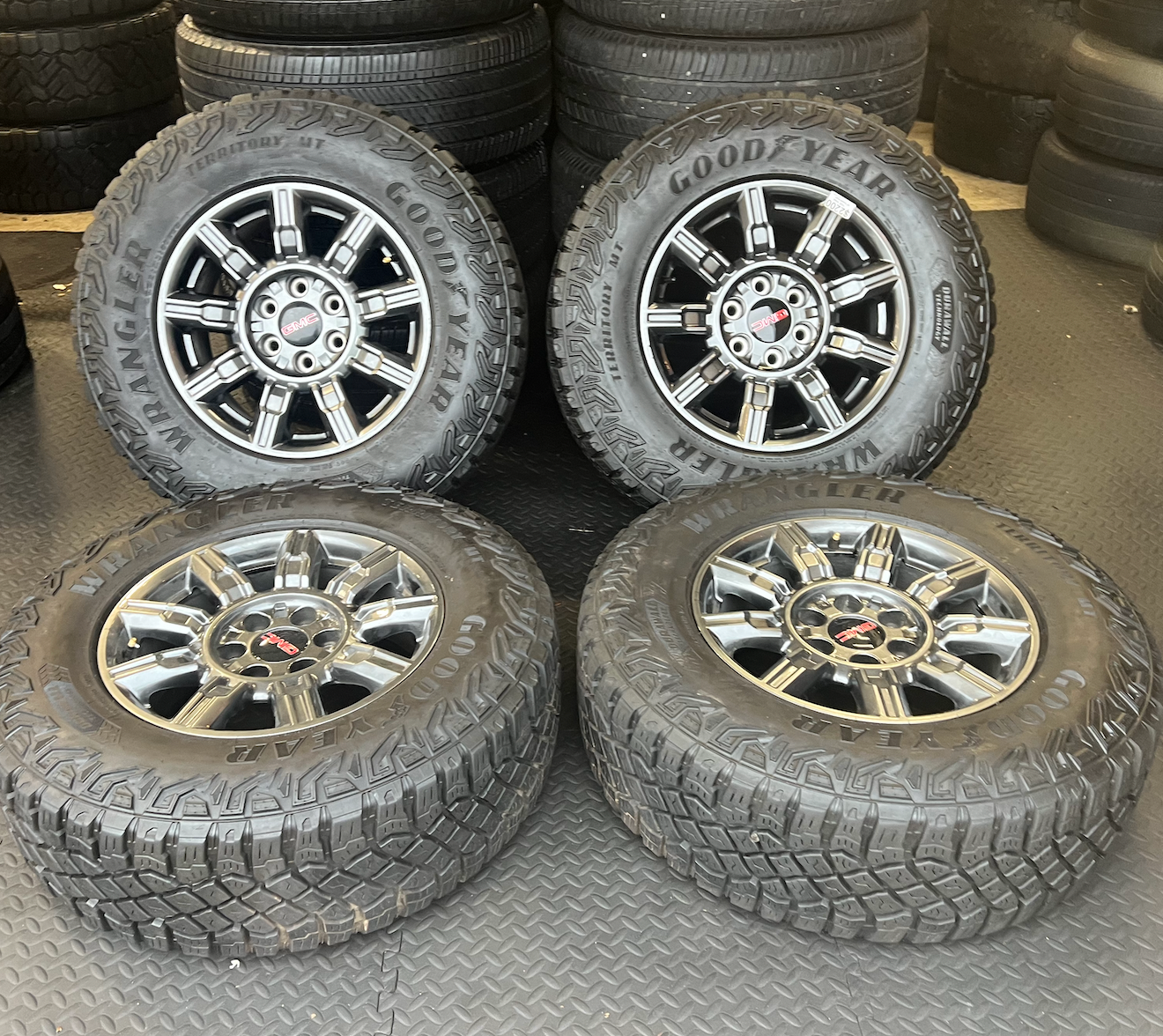 OEM 18” AT4X machined aluminum Wheels wrapped in Goodyear Wrangler Territory M/T tires.