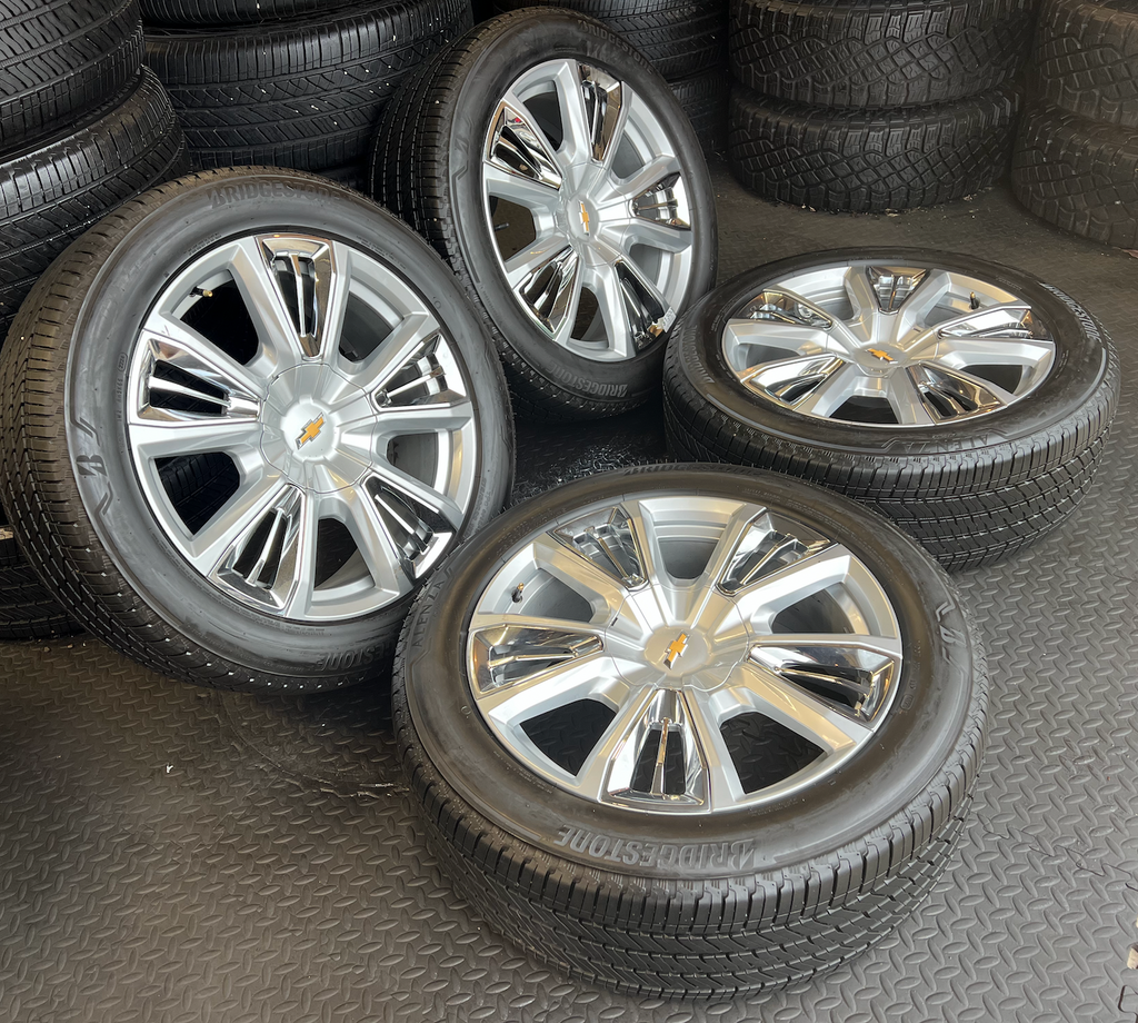 OEM 22” Chevrolet High Country Wheels wrapped in Bridgestone tires.