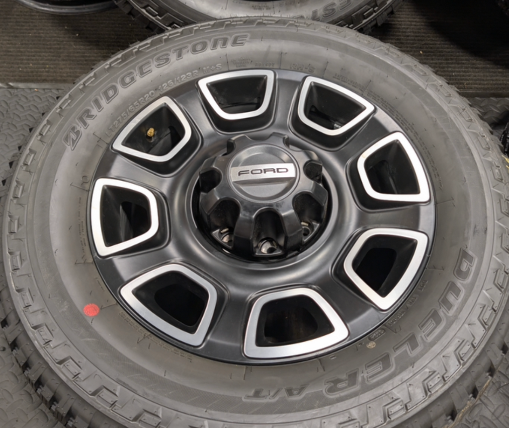 Machined Ford F-250 / F-350 Super Duty Platinum OEM 20” Wrapped in Bridgestone Dueler A/T LT275/65R20