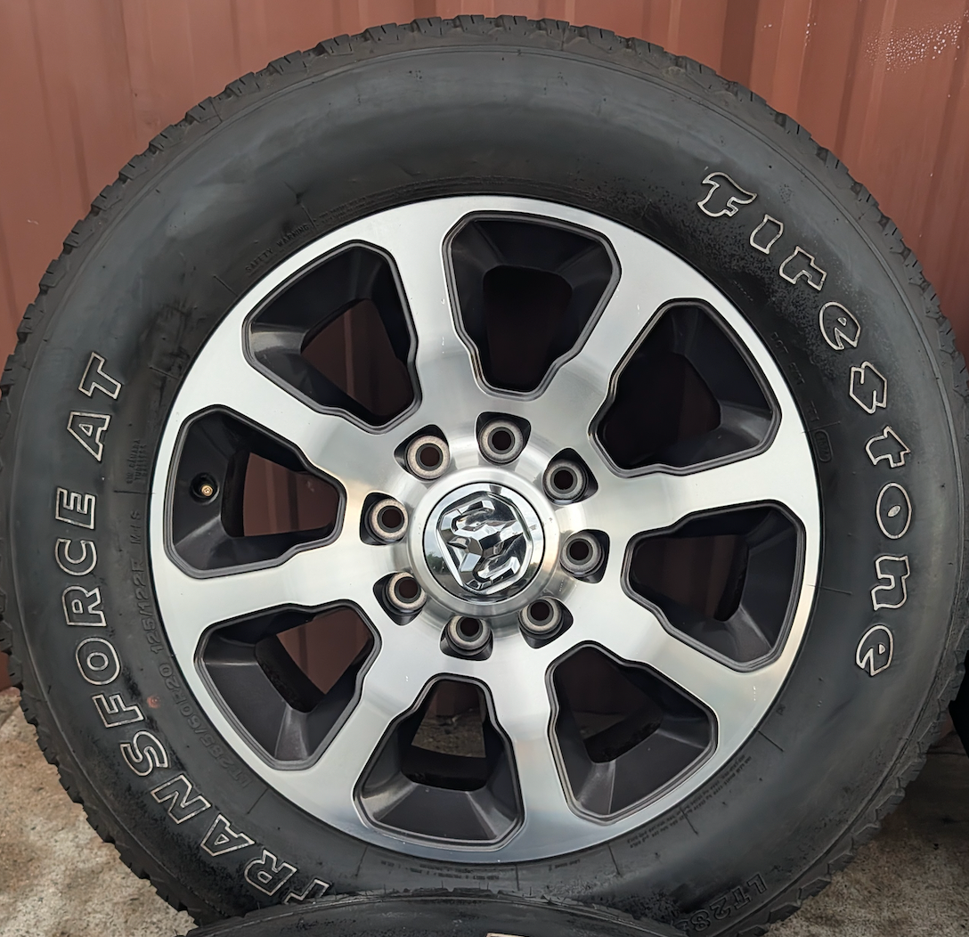 Machined 2500 / 3500 Laramie Longhorn OEM 20” Wrapped in Firestone Transforce A/T LT285/60R20