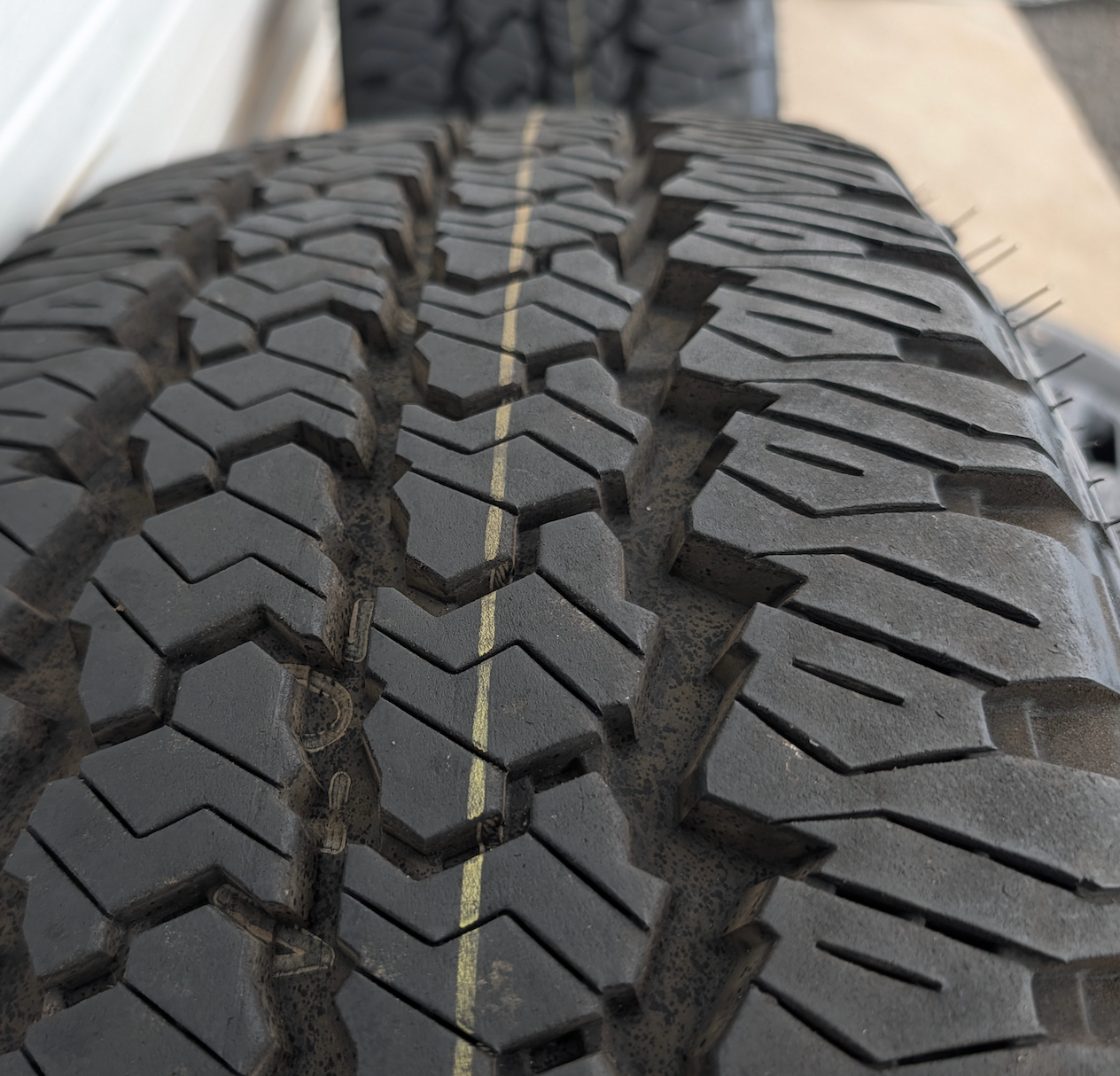 Matte Black Ram 2500 / 3500 OEM 20” Wrapped in Firestone Transforce AT2 LT285/60R20