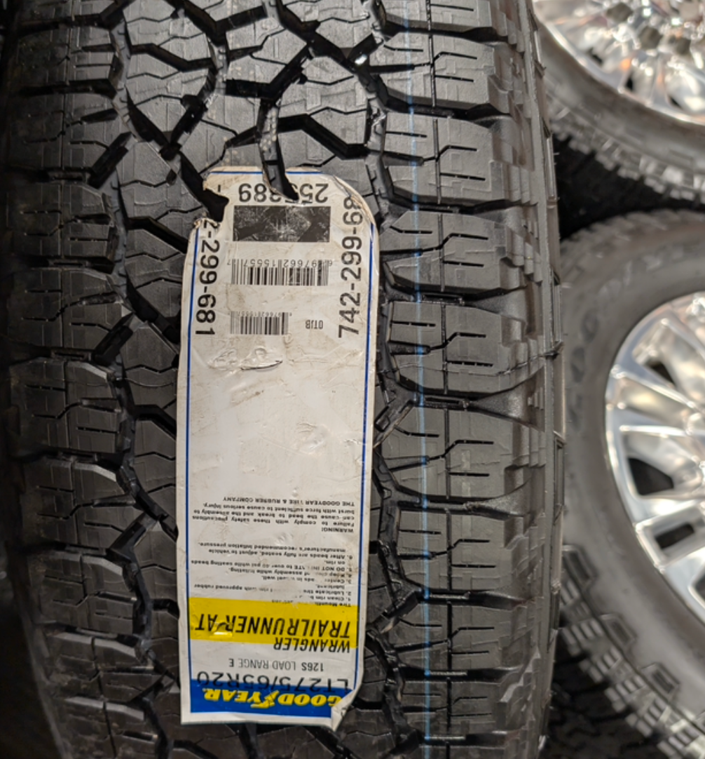 Polished Chevrolet Silverado 2500HD / 3500HD LTZ / High Country OEM 20” Wrapped in Goodyear Wrangler TrailRunner A/T LT275/65R20