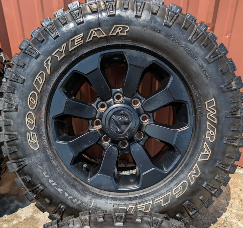 Matte Black Ram 2500 / 3500 Power Wagon OEM 17” Wrapped in Goodyear Wrangler DuraTrac LT285/70R17