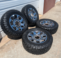 OEM 20” Chrome Ford F-250 / F-350 King Ranch / Lariat Wheels wrapped in LT275/65R20 Nitto Ridge Grappler tires.