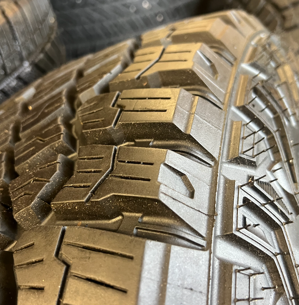 OEM 18” Wheels wrapped in Goodyear Wrangler Territory M/T tires.