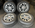 OEM Rebuilt 20” Polished Wheels wrapped in Bridgestone Dueler tires.