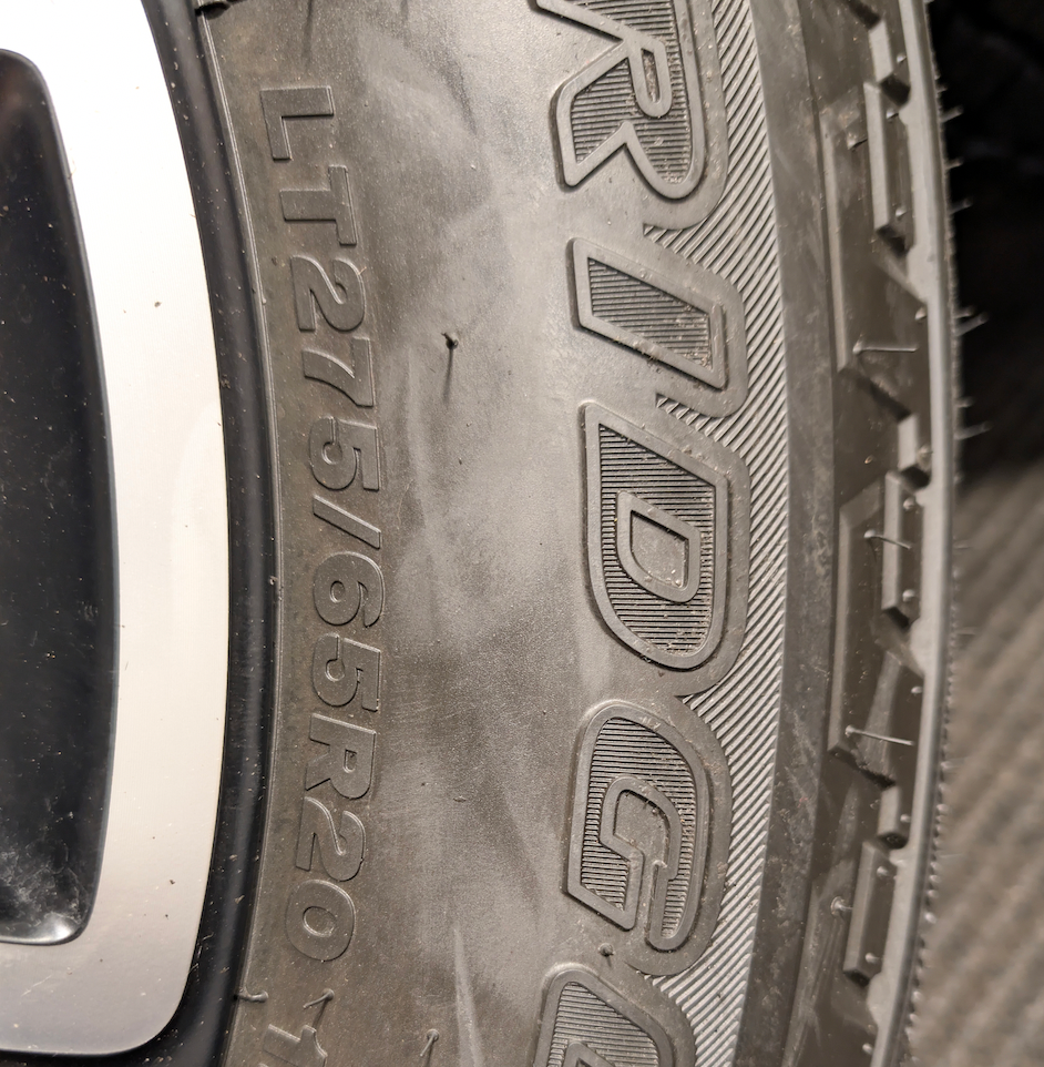 Machined Ford F-250 / F-350 Super Duty Platinum OEM 20” Wrapped in Bridgestone Dueler A/T LT275/65R20