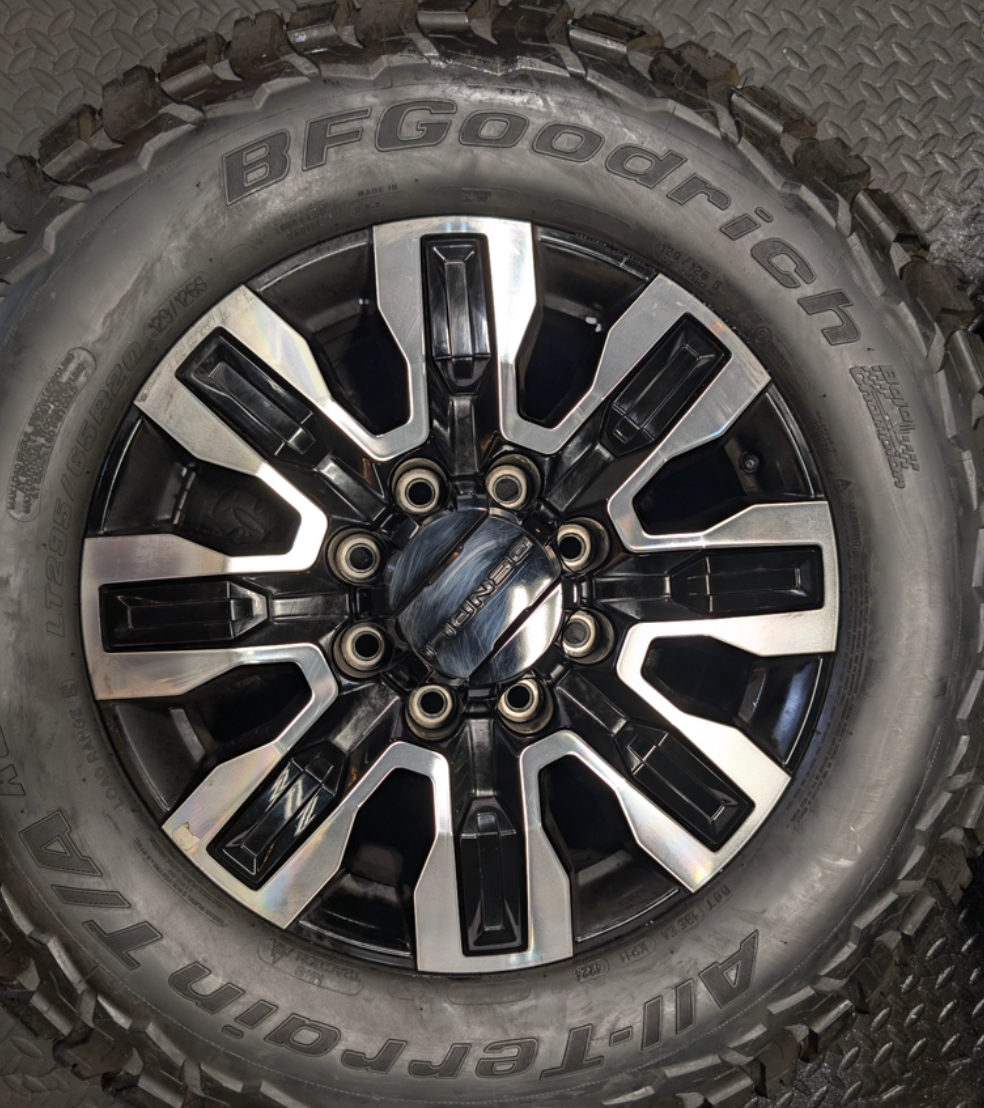 OEM 20” GMC Sierra Denali Ultimate 2500HD / 3500HD Machined Wheels wrapped in BFGoodrich All-Terrain T/A KO3 tires.