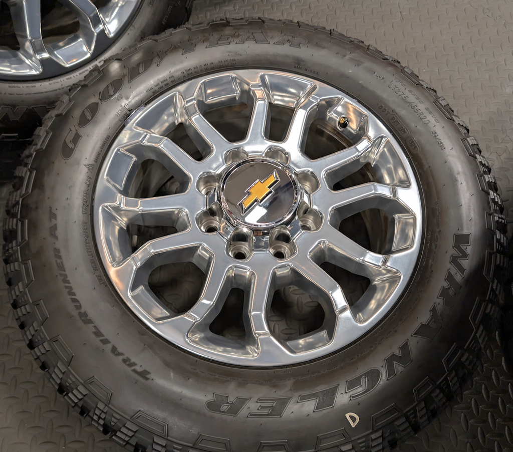 Polished Chevrolet Silverado 2500HD / 3500HD LTZ OEM 20” Wrapped in Goodyear Wrangler TrailRunner A/T LT275/65R20