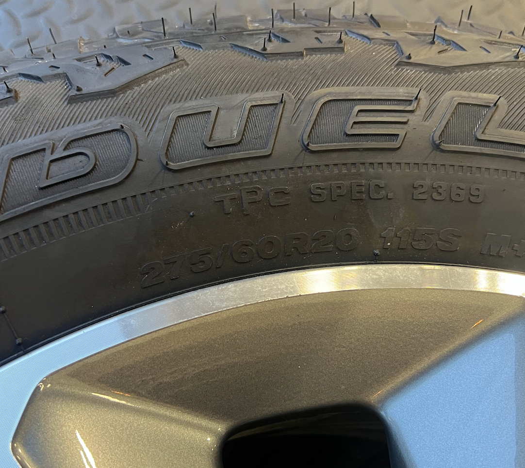 OEM 20” Gunmetal & Machined RST Wheels wrapped in Bridgestone Dueler A/T tires.