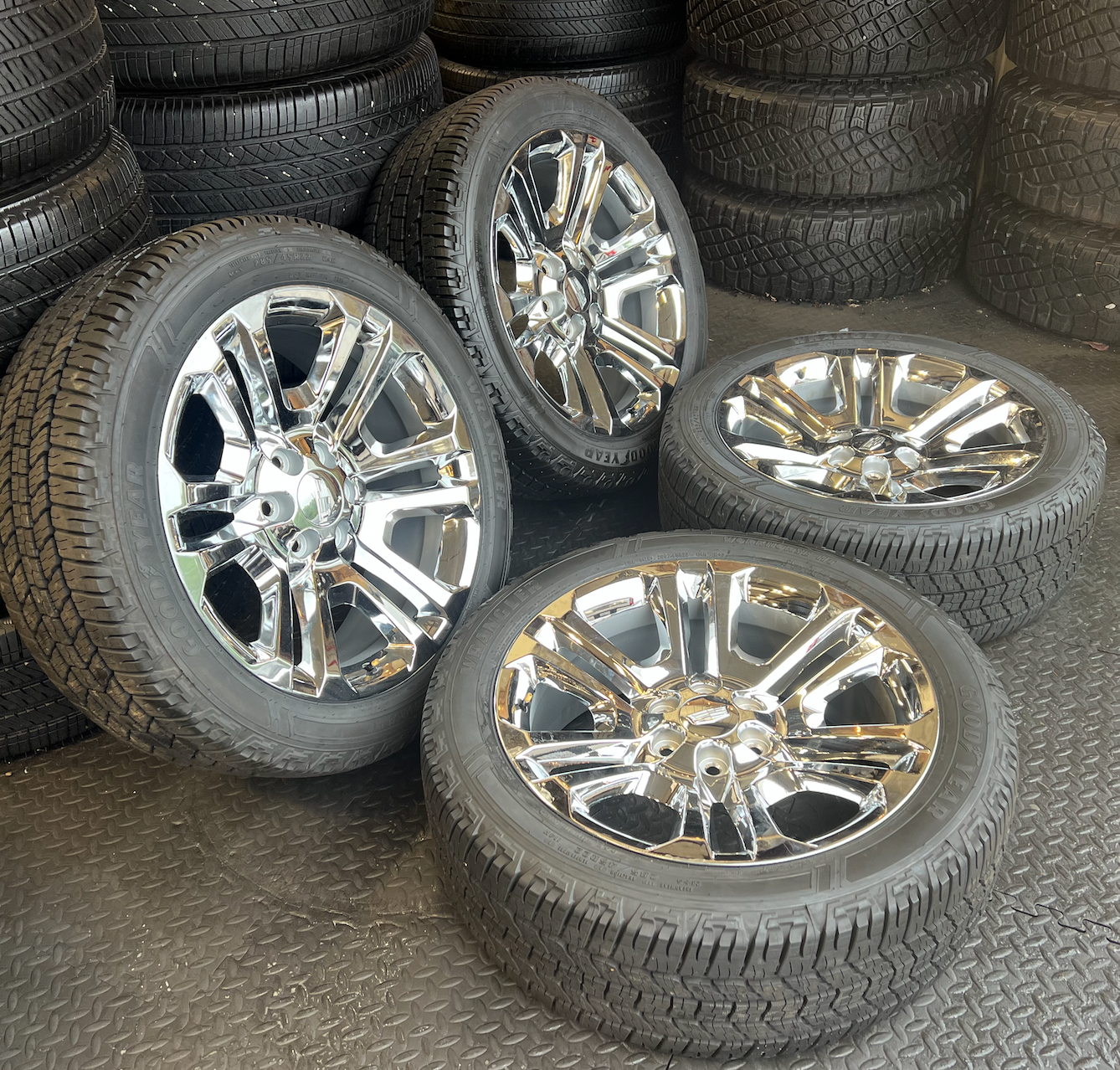 OEM 22” Split 6 Chrome  Wheels wrapped in Goodyear Wrangler Workhorse HT tires.